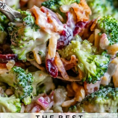 A vibrant bowl of the Best Broccoli Salad with fresh ingredients and dressing.
