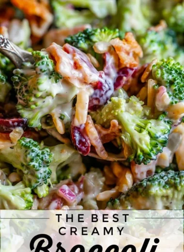 A vibrant bowl of the Best Broccoli Salad with fresh ingredients and dressing.