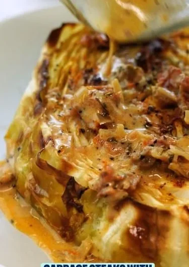 Crispy cabbage steaks served with sun-dried tomato cream sauce