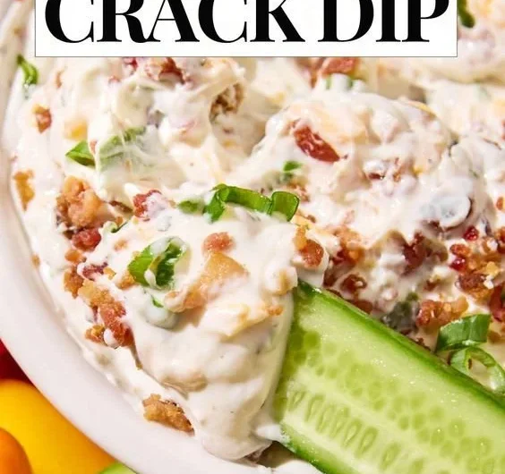 High protein crack dip served in a bowl with fresh vegetables for dipping