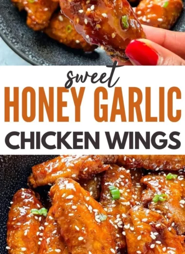 Delicious Honey Garlic Chicken Wings garnished with herbs on a platter.
