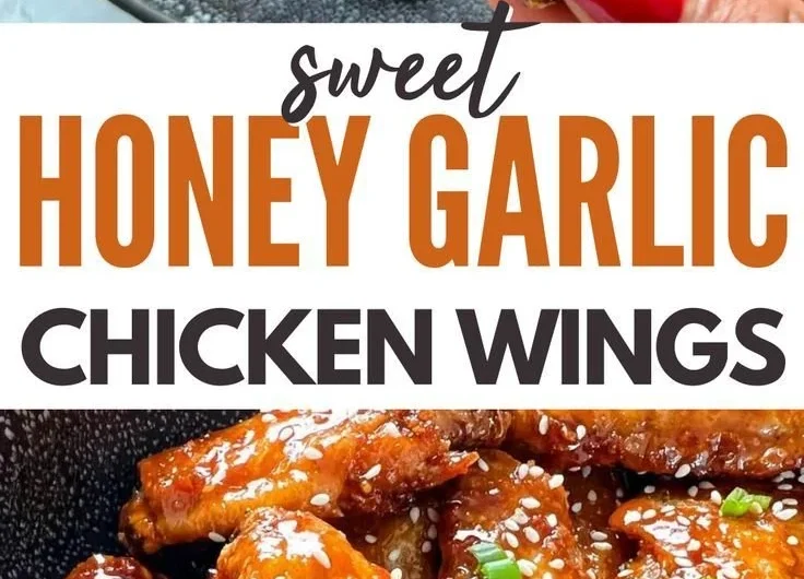 Delicious Honey Garlic Chicken Wings garnished with herbs on a platter.