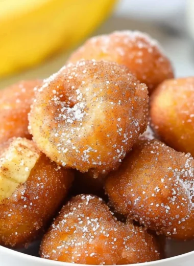 Homemade 2-ingredient banana donut holes on a plate.