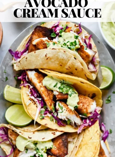 Blackened fish tacos served with a rich avocado cream sauce