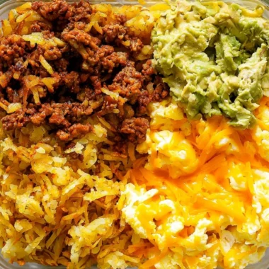 Delicious healthy breakfast burrito bowl with fresh ingredients and toppings