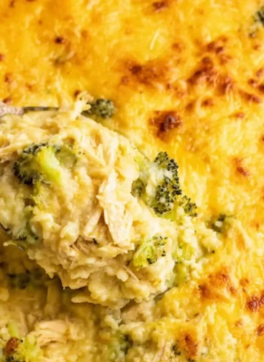 Delicious broccoli cheese casserole with rice and chicken baked in a creamy cheese sauce