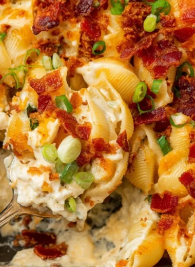 Delicious Chicken Bacon Ranch Casserole topped with crispy bacon and cheese