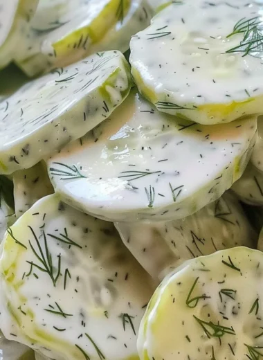 Creamy cucumber salad with fresh herbs and a creamy dressing