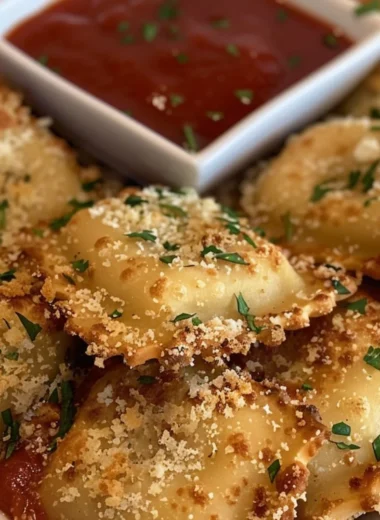 Crispy air fryer ravioli served with marinara sauce on a plate