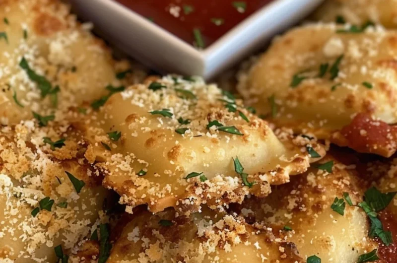 Crispy air fryer ravioli served with marinara sauce on a plate