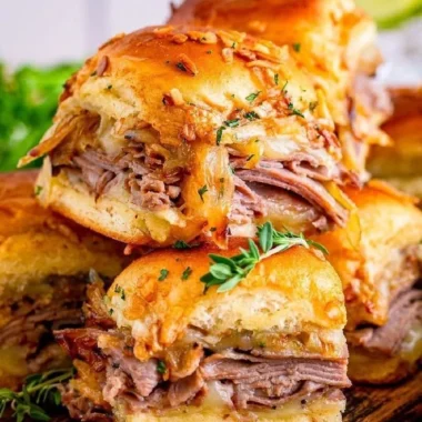 French Dip Sliders served with au jus for dipping