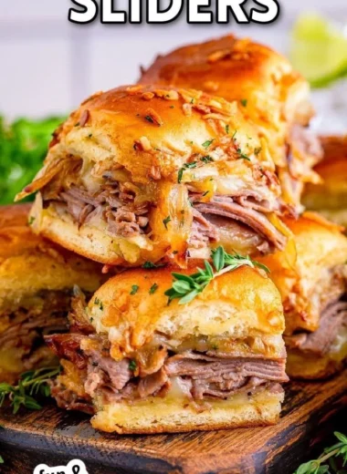 French Dip Sliders served with au jus for dipping