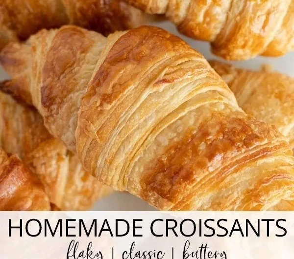 Homemade classic croissants, golden and flaky pastries on a plate