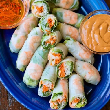 Homemade fresh Vietnamese spring rolls filled with vegetables and herbs