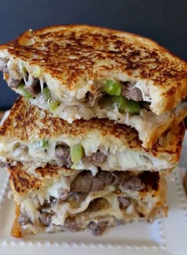 Philly Cheesesteak Grilled Cheese sandwich with melted cheese and beef