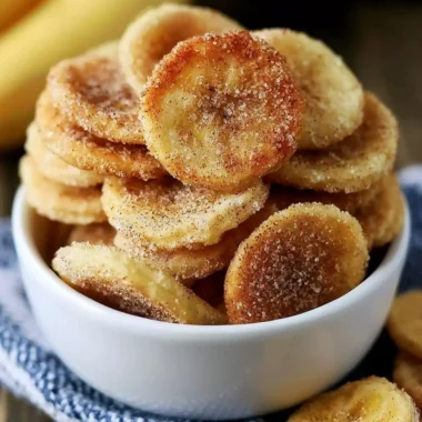 Crispy cinnamon-sugar air fryer banana chips in a bowl