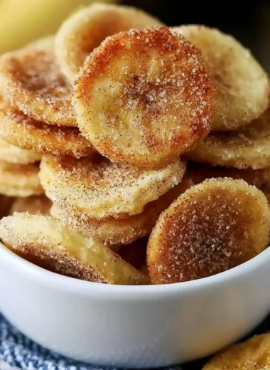 Crispy cinnamon-sugar air fryer banana chips in a bowl