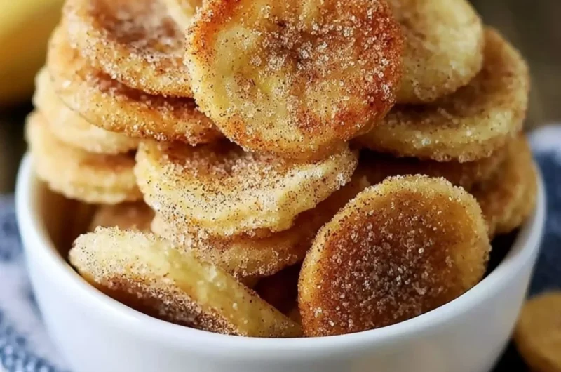 Crispy cinnamon-sugar air fryer banana chips in a bowl