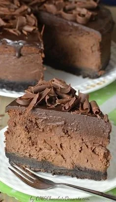 Triple Chocolate Cheesecake with Oreo Crust topped with chocolate shavings