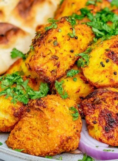 Authentic Bombay Potatoes served in a traditional dish with spices