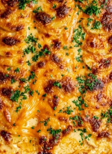 Delicious and creamy Au Gratin Potatoes baked to perfection
