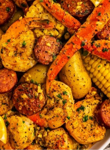 Delicious Cajun seafood boil with shrimp, crab, and spices served in a cozy dining setting.