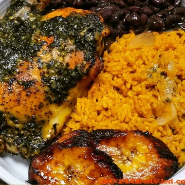 Cozy chicken yellow rice with black beans served in a colorful bowl.
