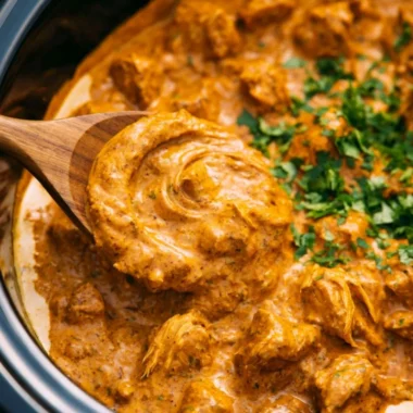 Delicious cozy crockpot butter chicken served in a bowl