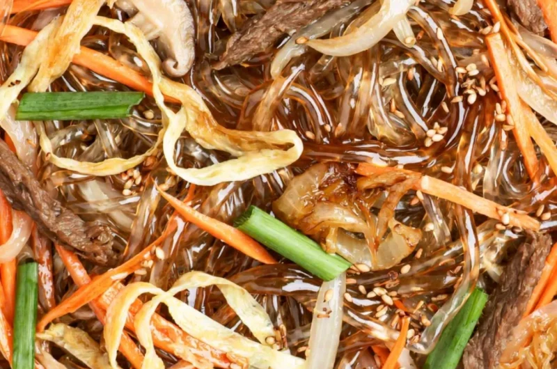 Delicious bowl of Japchae, Korean stir-fried noodles with vegetables.