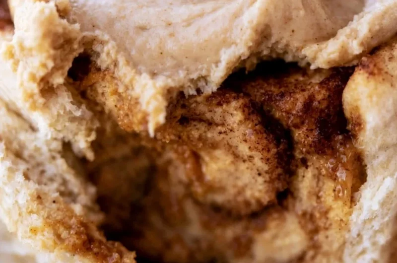 Cozy pumpkin butter cinnamon rolls with a rich creamy glaze