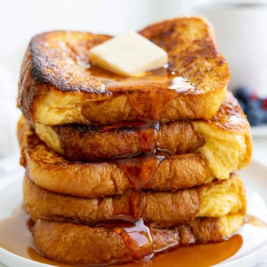 Serving of easy French toast with syrup and berries