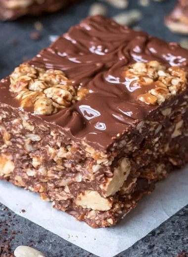 Homemade no bake keto chocolate crunch bars with crunchy texture and chocolate topping