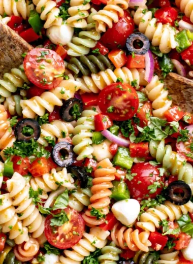 Italian pasta salad with fresh vegetables and dressing, a nostalgic dish.