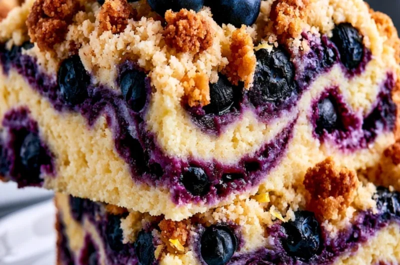 Delicious Lemon Blueberry Cake with fresh blueberries and lemon slices