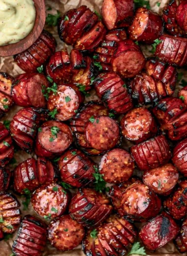 Mustard Hasselback Kielbasa Bites on a platter