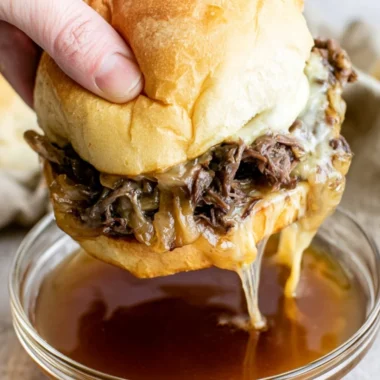Delicious cozy French dip sandwiches served with au jus for dipping