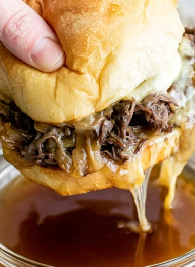 Delicious cozy French dip sandwiches served with au jus for dipping
