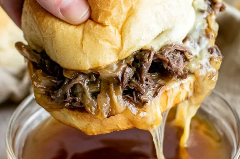 Delicious cozy French dip sandwiches served with au jus for dipping