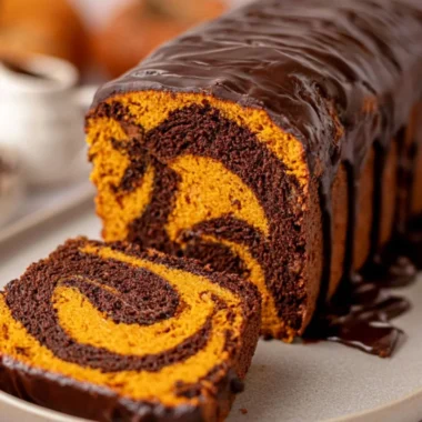 Cozy vegan pumpkin marble cake with swirls of chocolate and autumn spices