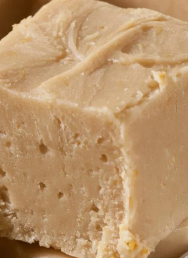 Delicious homemade Peanut Butter Fudge cut into squares.